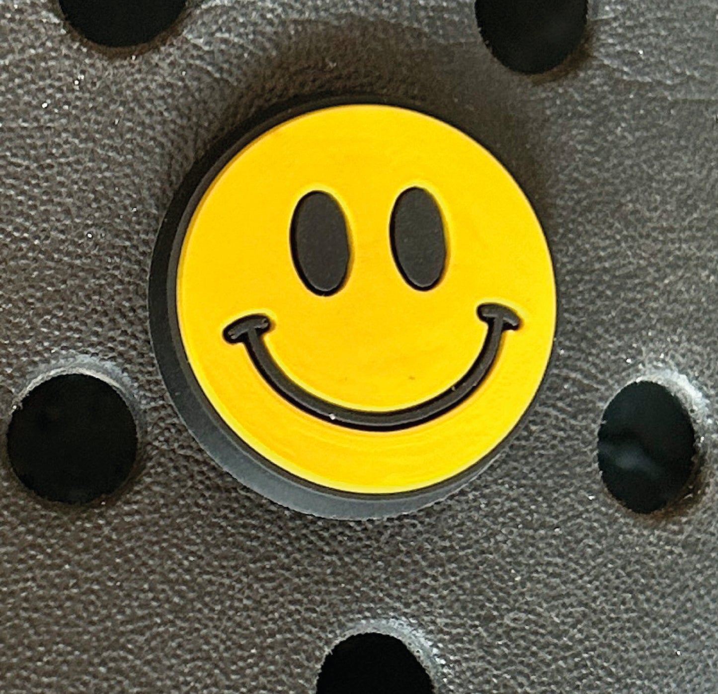 Yellow retro acid house smiley face croc like shoe charm. Shoe decoration.