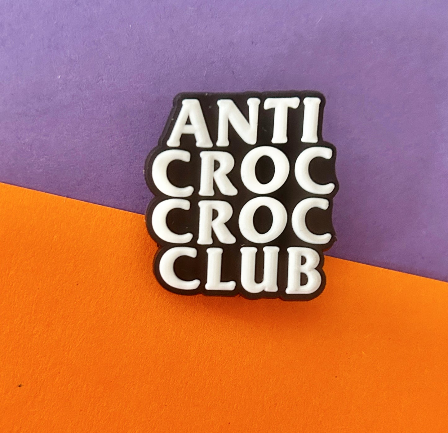 anti croc croc club shoe charm.
