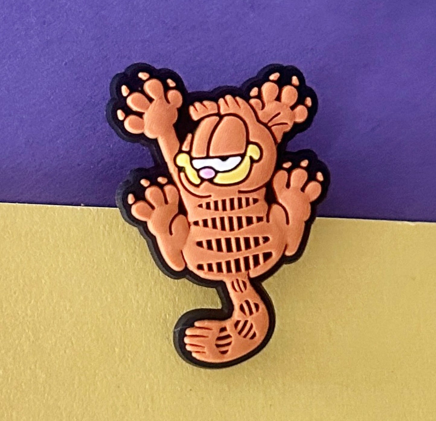 Famous ginger cat with attitude shoe charm.