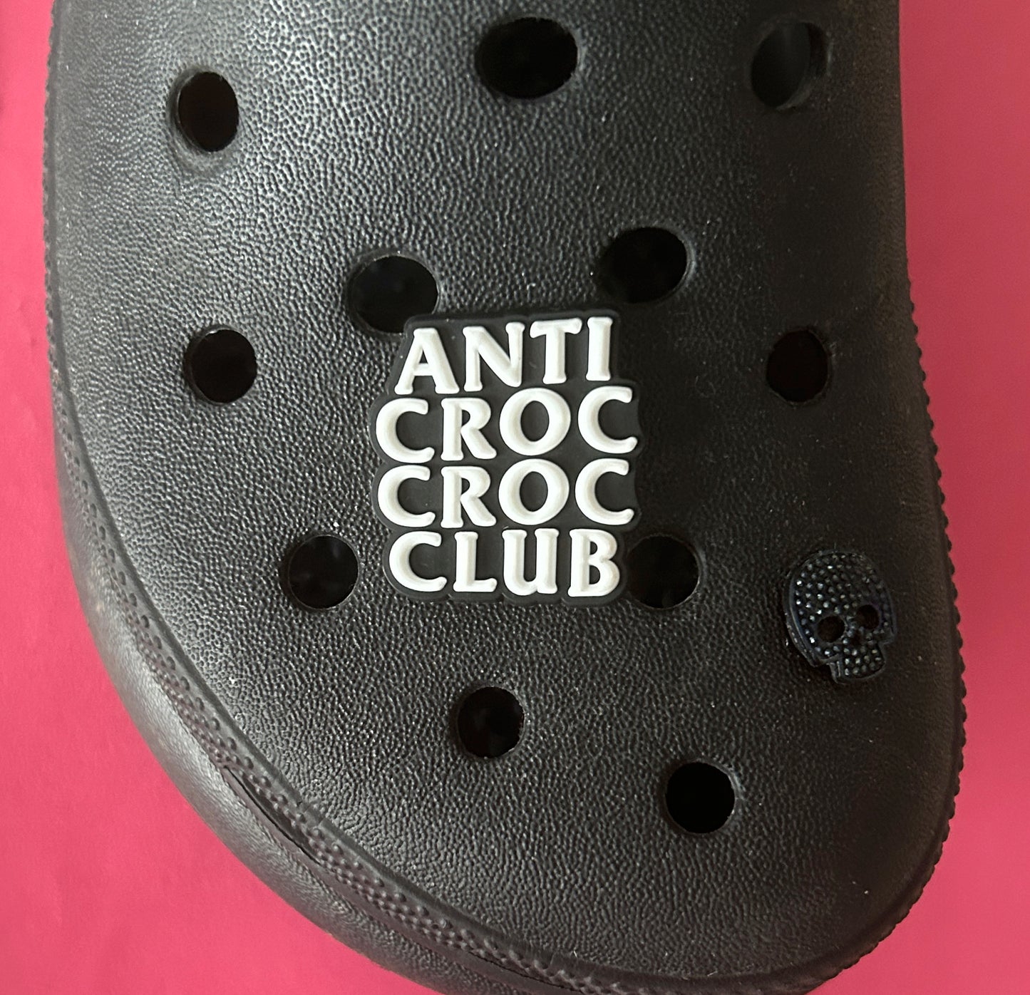 anti croc croc club shoe charm.