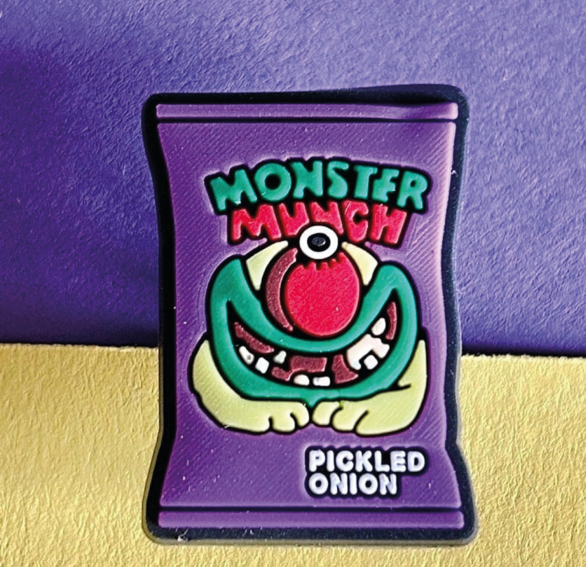 Packed of pickled onion monster munch crisps croc like shoe charm.