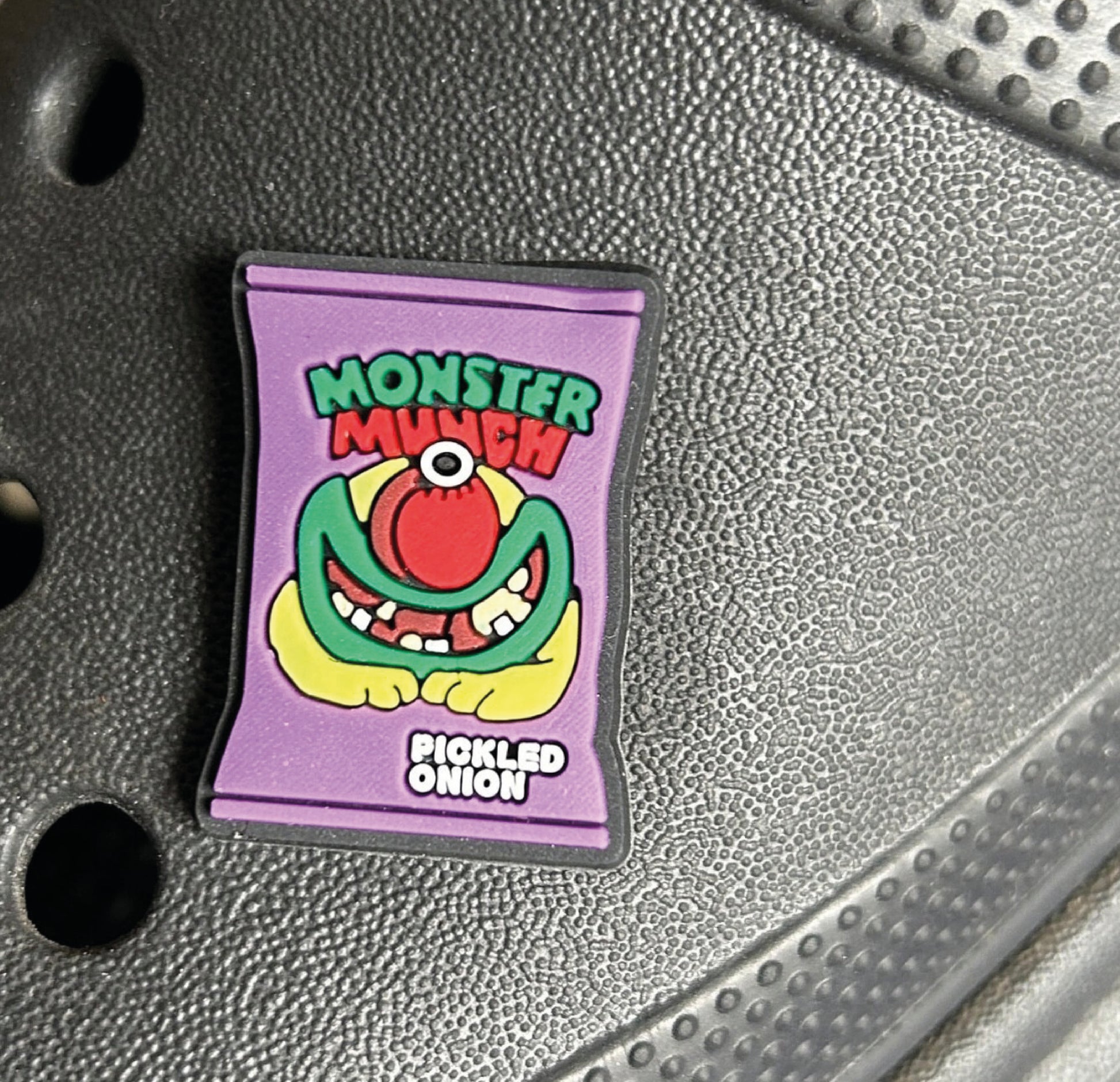 Packed of pickled onion monster munch crisps croc like shoe charm.