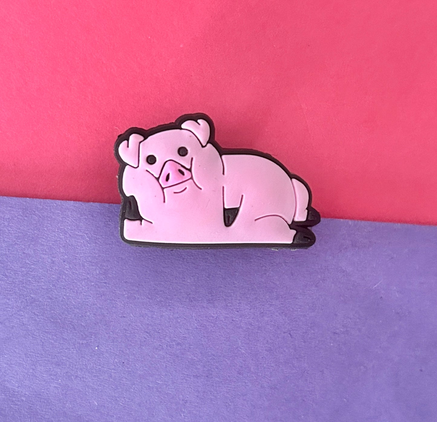 Posing sexy pig croc charm.