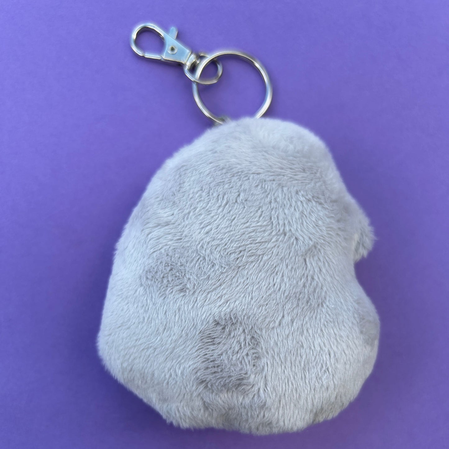 Handmade pigeon keyring gift for bird lovers. Back view.