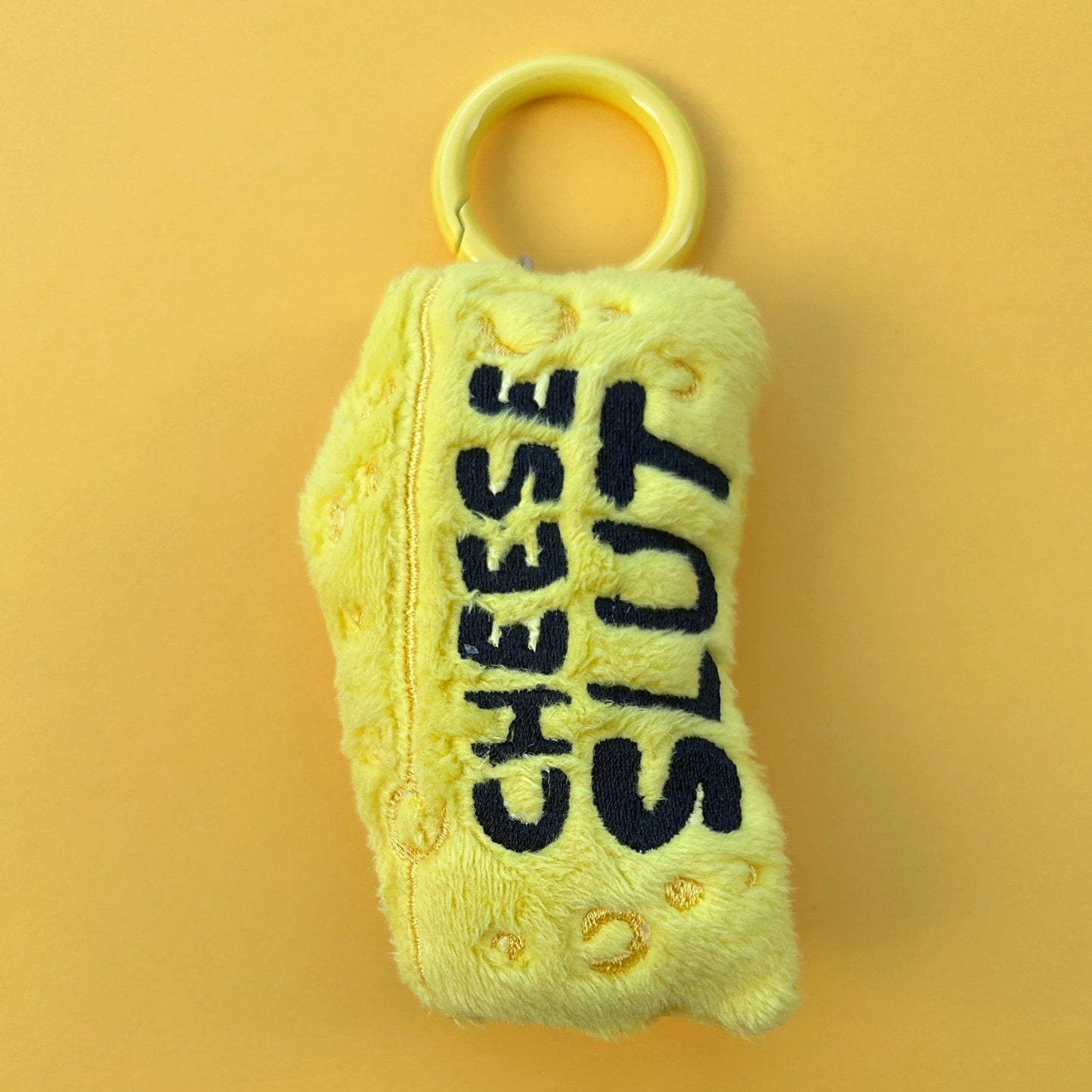Handmade Cheese Slut plush keyring wedge design.