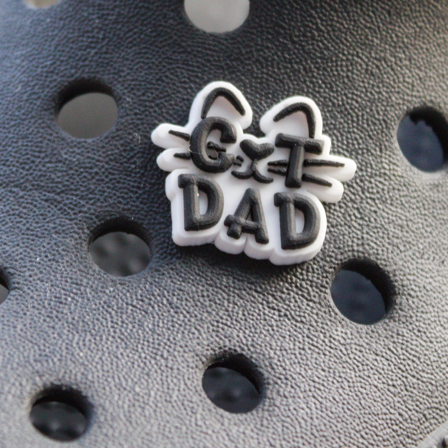 Cat Dad croc like shoe charm. Black and White. Modelled on a Black croc shoe.