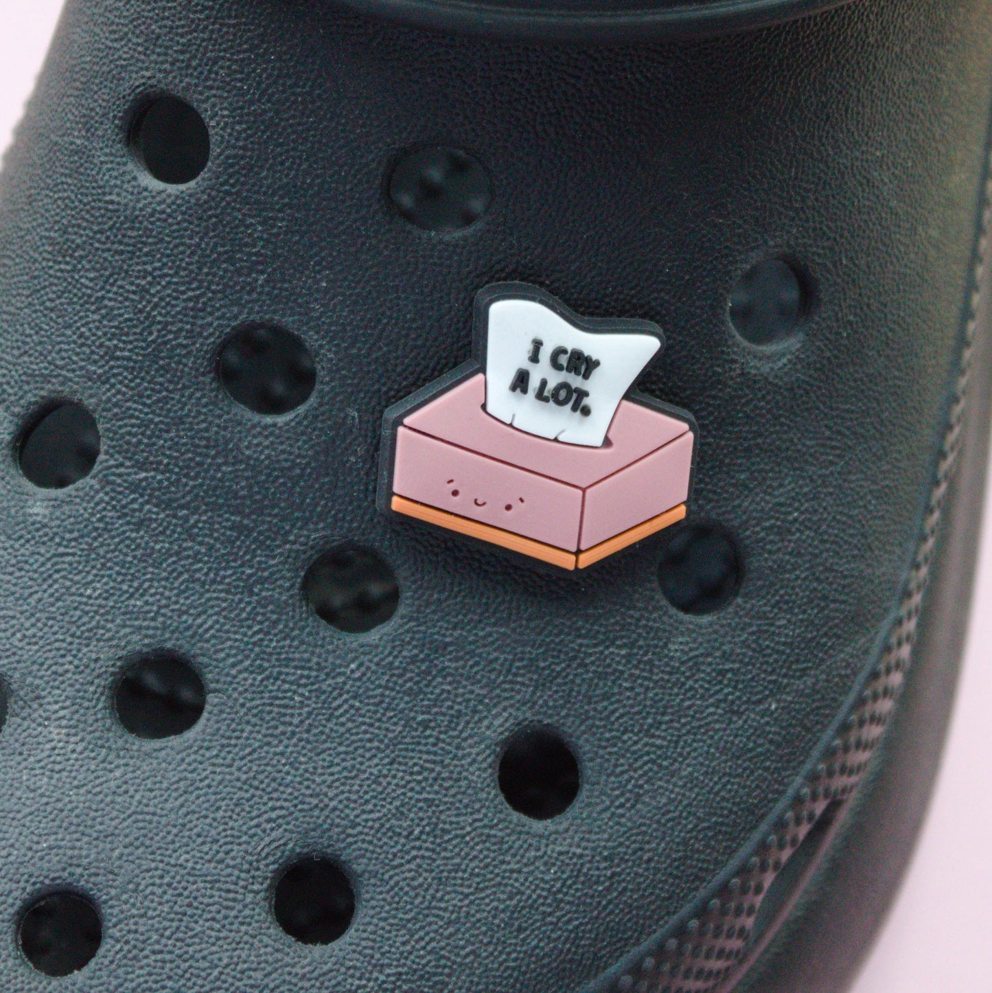 I Cry A Lot Box Of Tissues croc like shoe charm. Modelled on a black croc shoe.