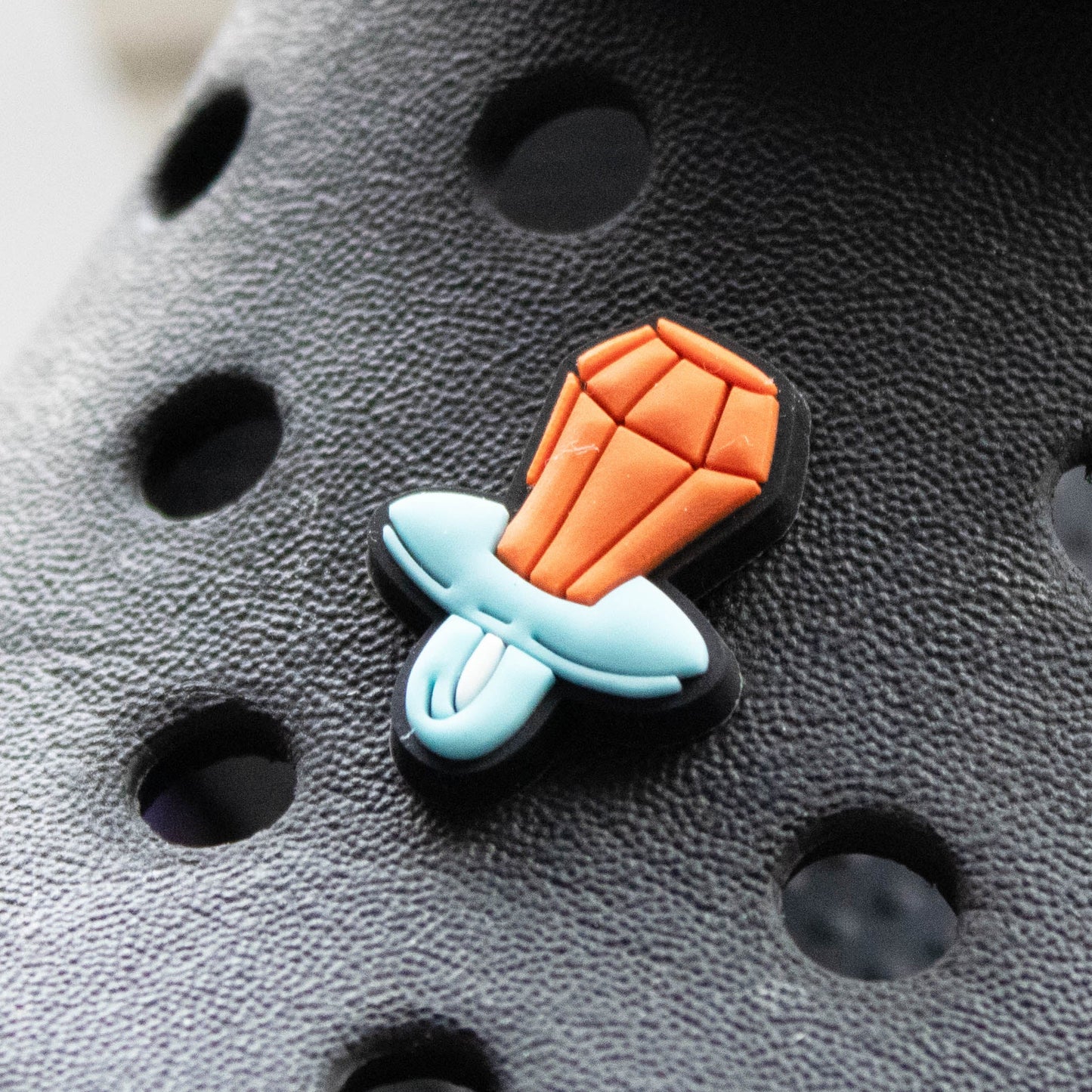 90's Ring Pop Dummy Sweet croc like shoe charm. Modelled on a black croc shoe.