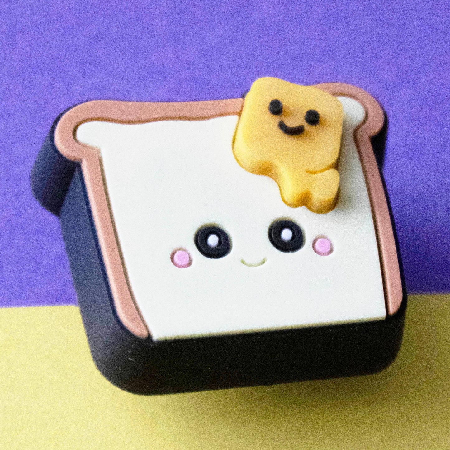 Toast and Butter Premium croc charm. Close up.