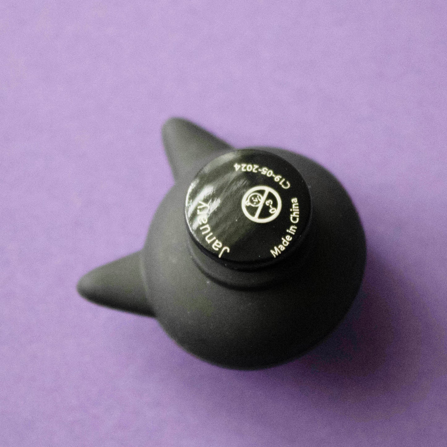 Black cat face 3D croc like shoe charm. Premium quality. Back of charm.