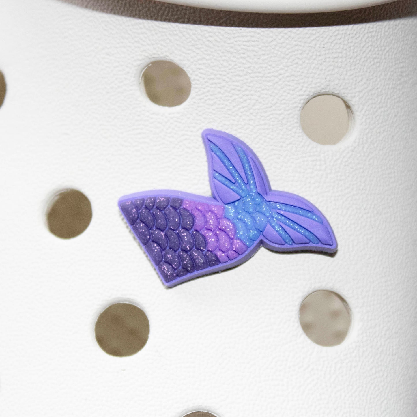 Purple and Pink Glitter mermaid tail croc like shoe charm. Premium quality. Modelled on a cream croc shoe.