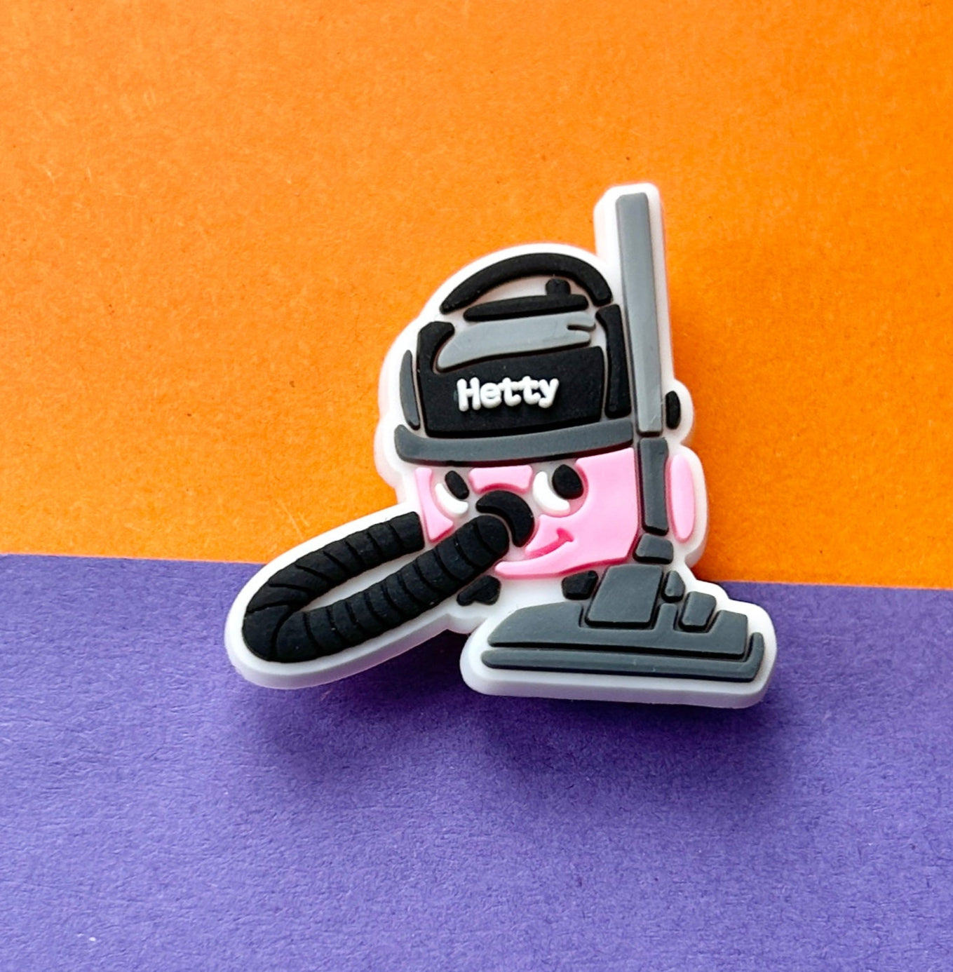 Pink Vacuum Cleaner croc like shoe charm.