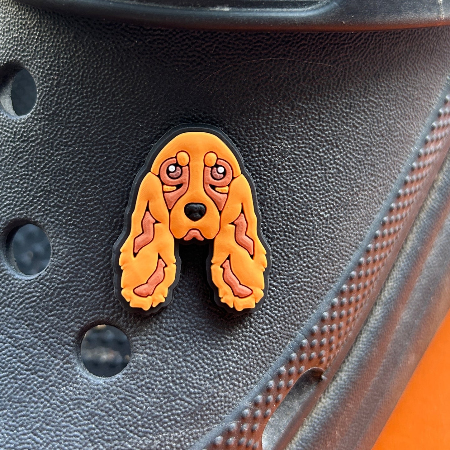 Cocker Spaniel Dog croc like shoe charm. Shown on a black croc shoe.