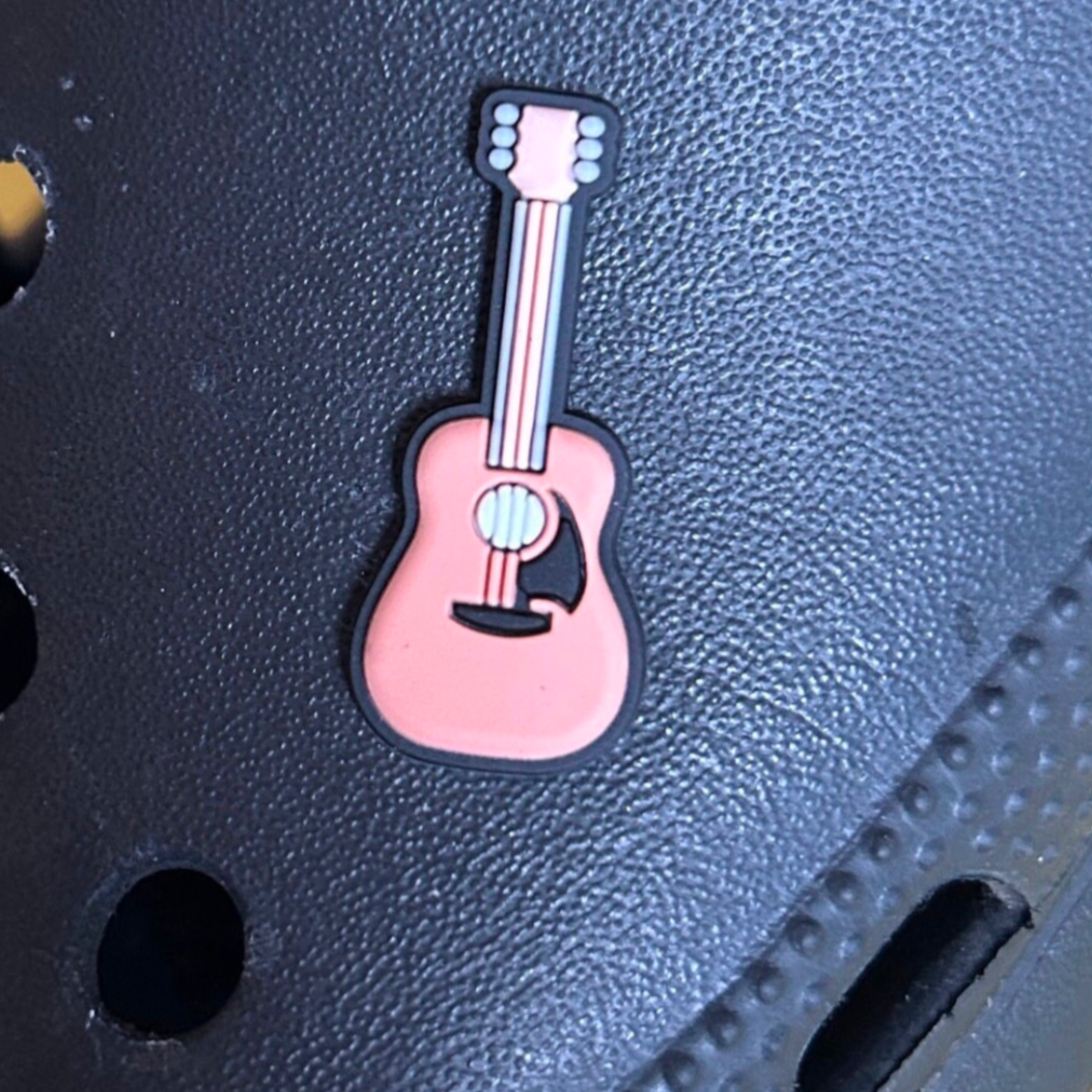 Acoustic Guitar croc like shoe charm. Shown on a black croc shoe.