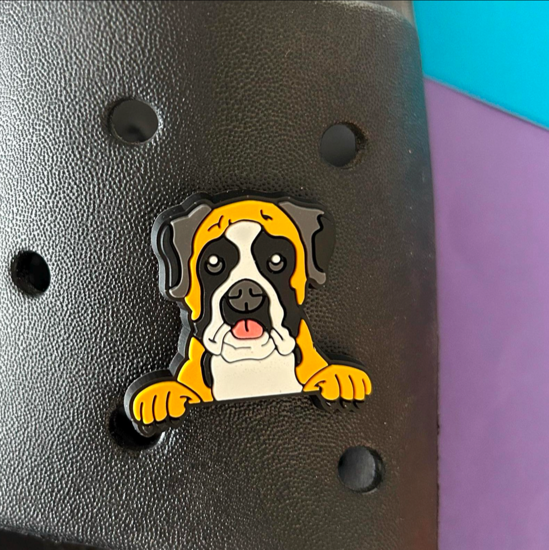 Boxer Dog Face croc like shoe charm. Shown on a black croc show.
