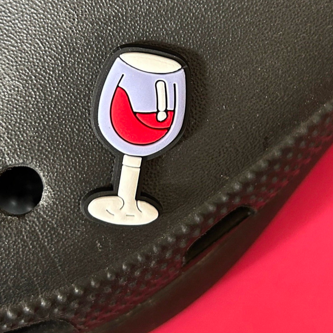 Glass of Red Wine croc like shoe charm. Shown on a black croc shoe.