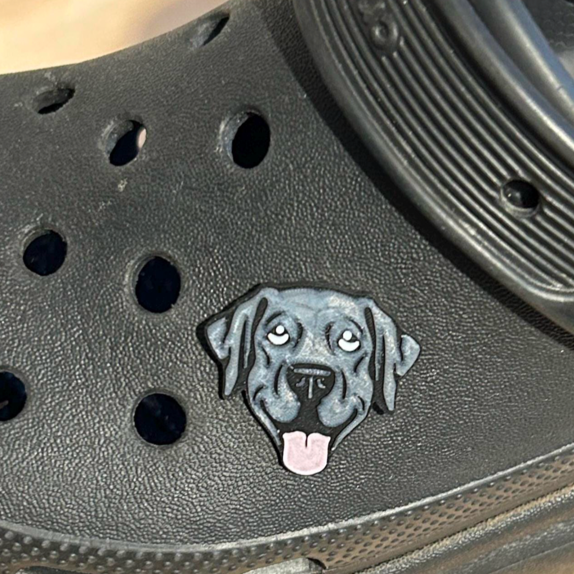 Handmade 3D Printed Black Labrador Dog, croc like shoe charm. Shown on a black croc shoe.