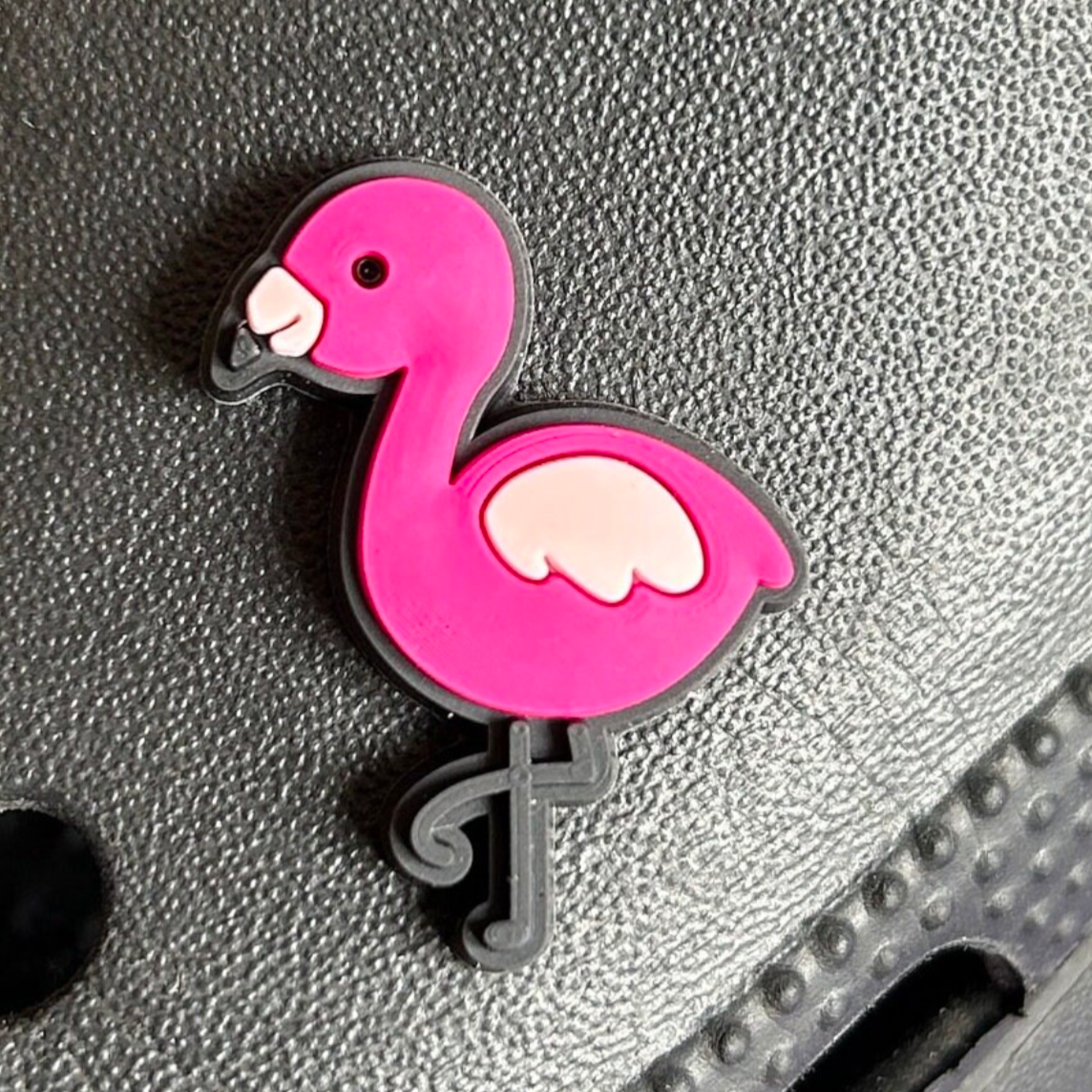Pink Flamingo Bird croc like shoe charm. Shown on a black croc shoe.