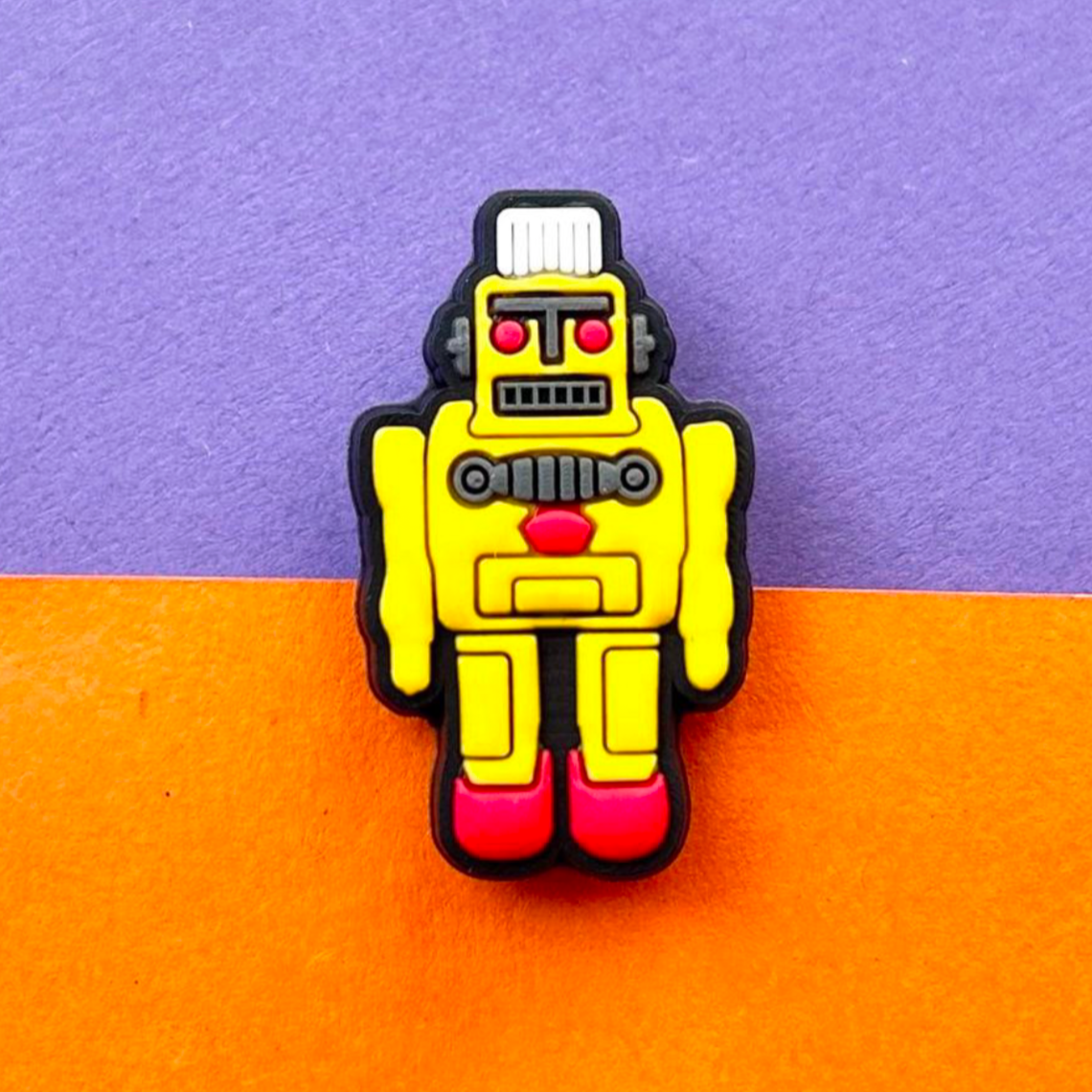 Yellow Robot croc like shoe charm.