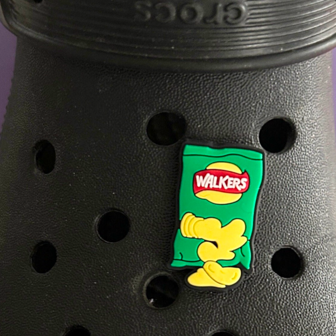 Green packet of crisps croc like shoe charm.
