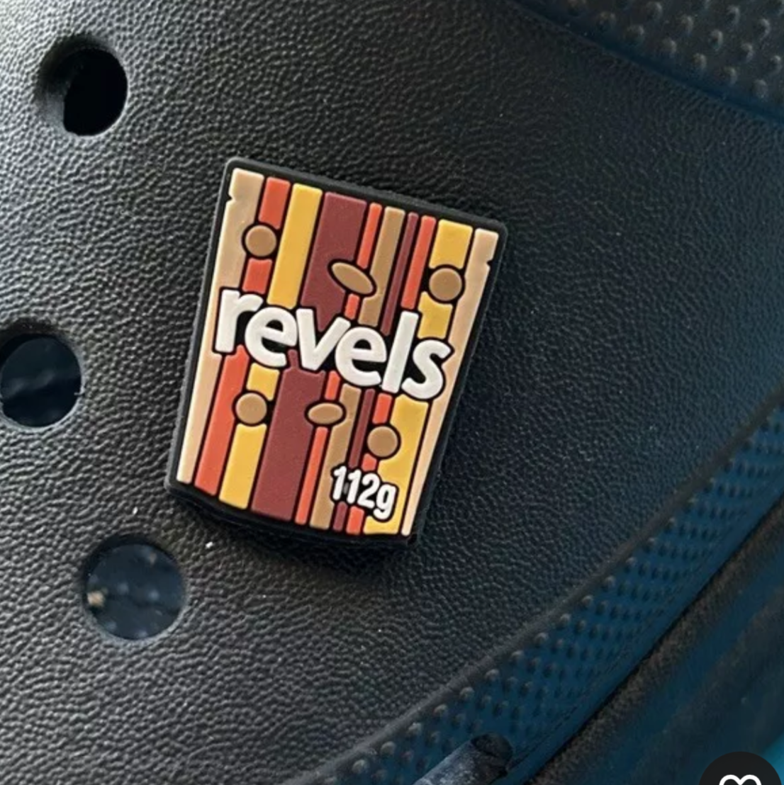 Revel Chocolate Sweets croc like shoe charm. Shown on a black croc shoe.