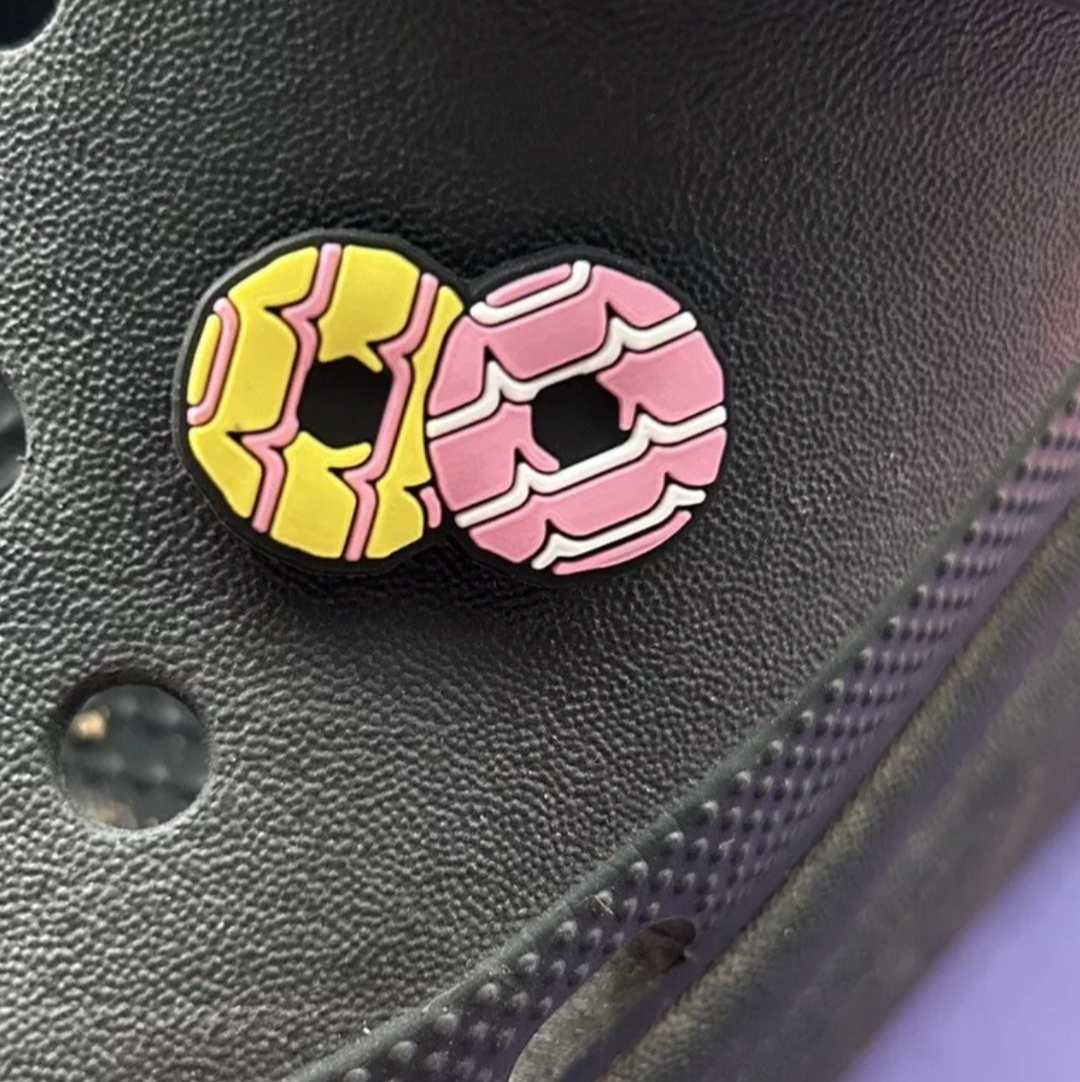Sugar Ring Biscuits croc like shoe charm. Shown on a black croc shoe.