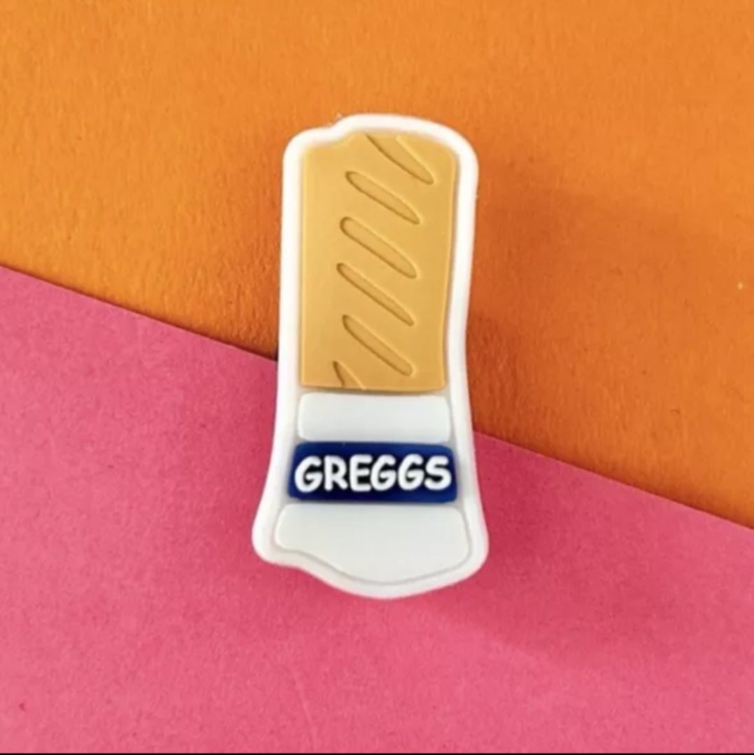 Sausage Roll croc like shoe charm.