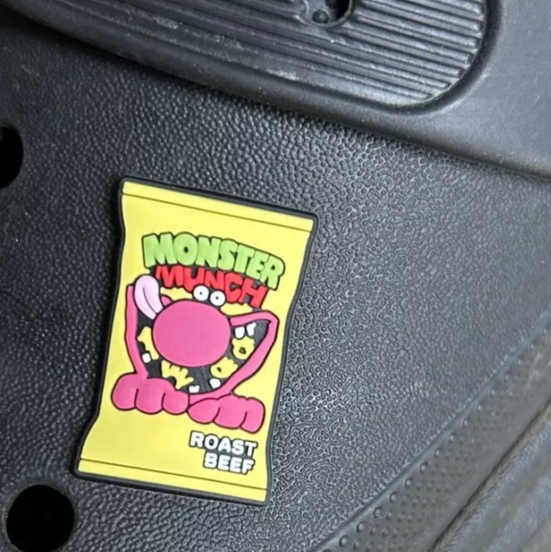 Roast Beef Monster Crisps croc like shoe charm. Shown on a black croc shoe.
