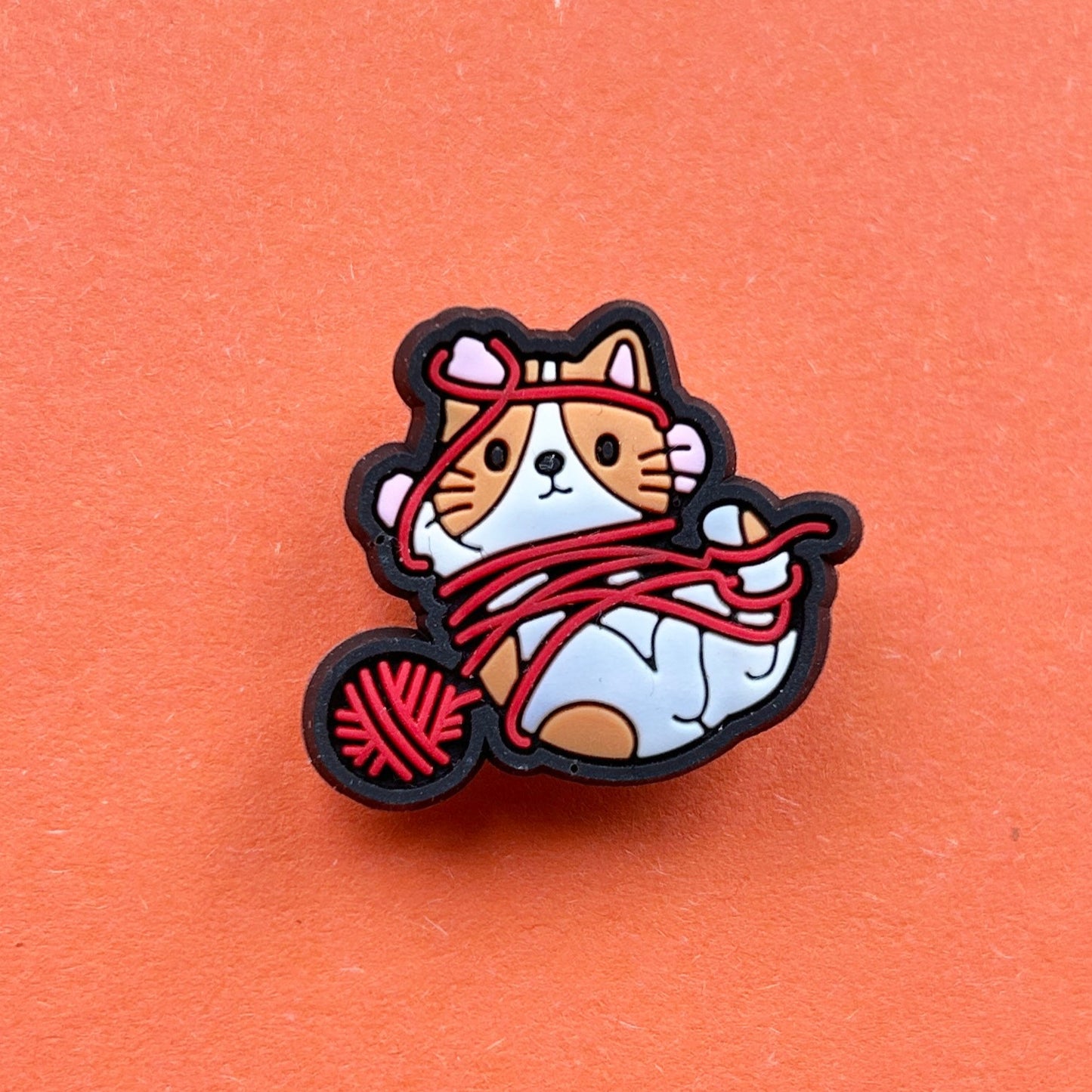 Cat with a Ball of Wool croc like shoe charm.