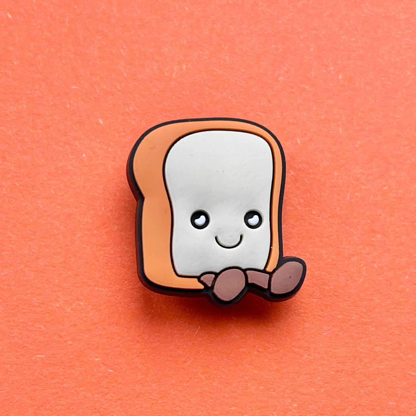 Happy Toast croc like shoe charm.