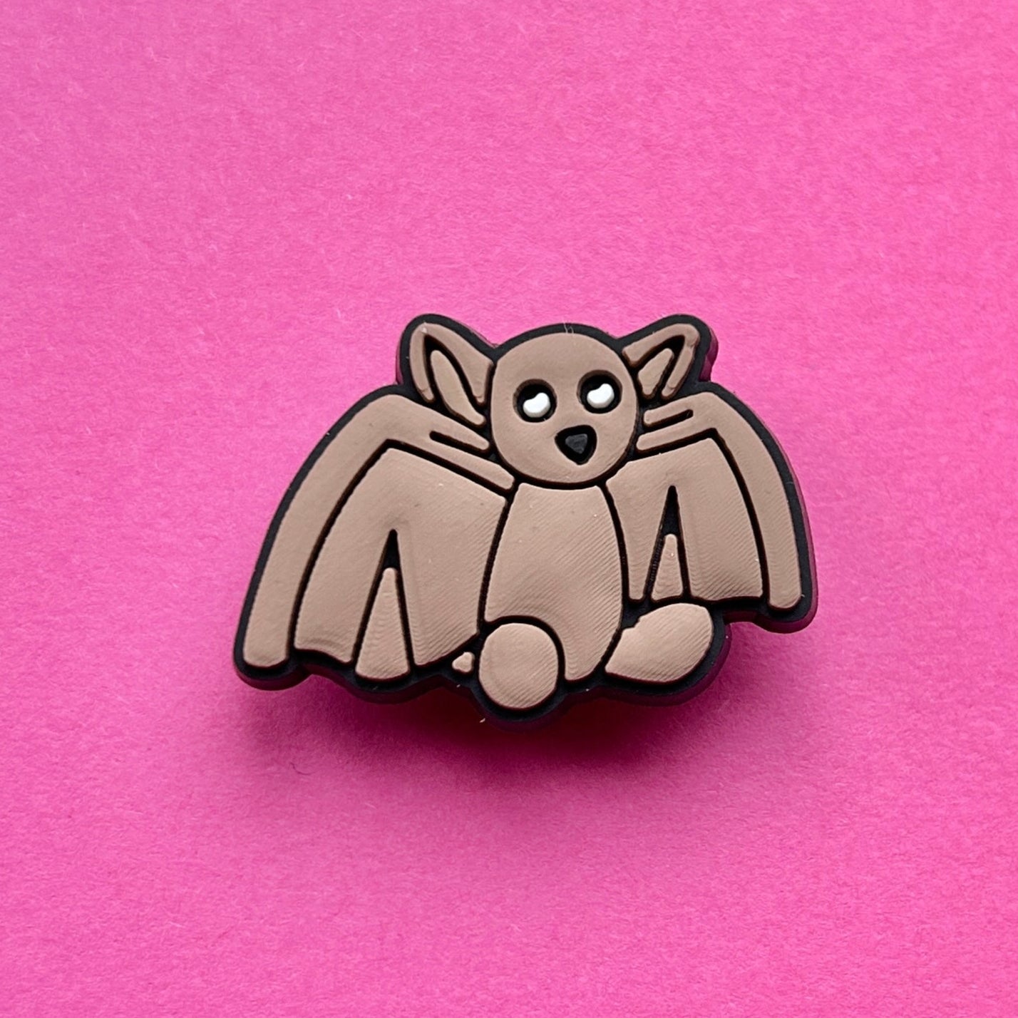 Brown Bat croc like shoe charm.