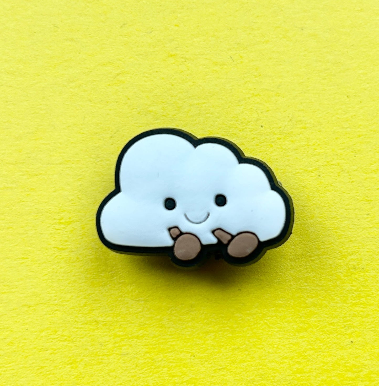 Cloud croc like shoe charm.