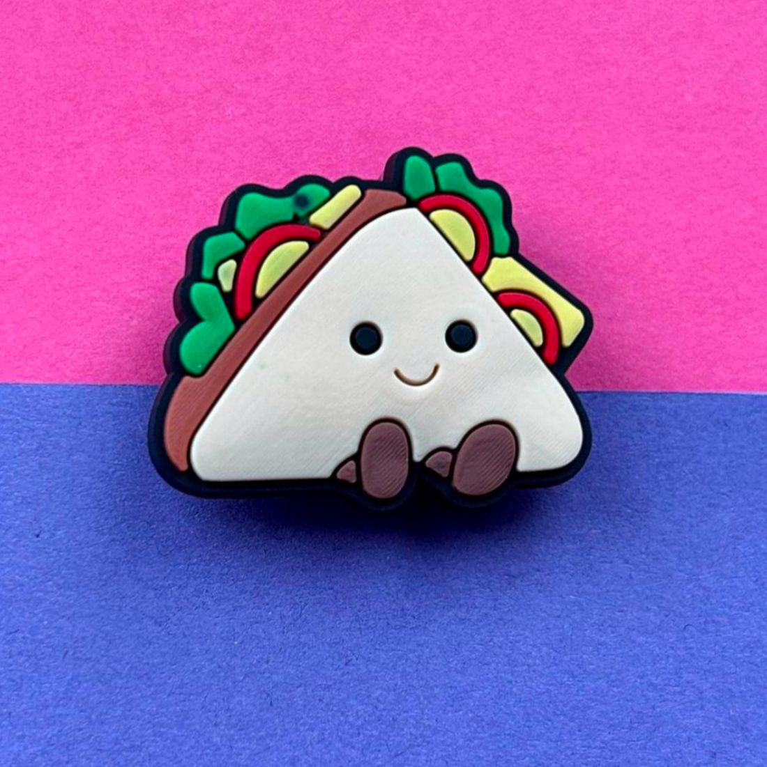 Sandwich croc like shoe charm.