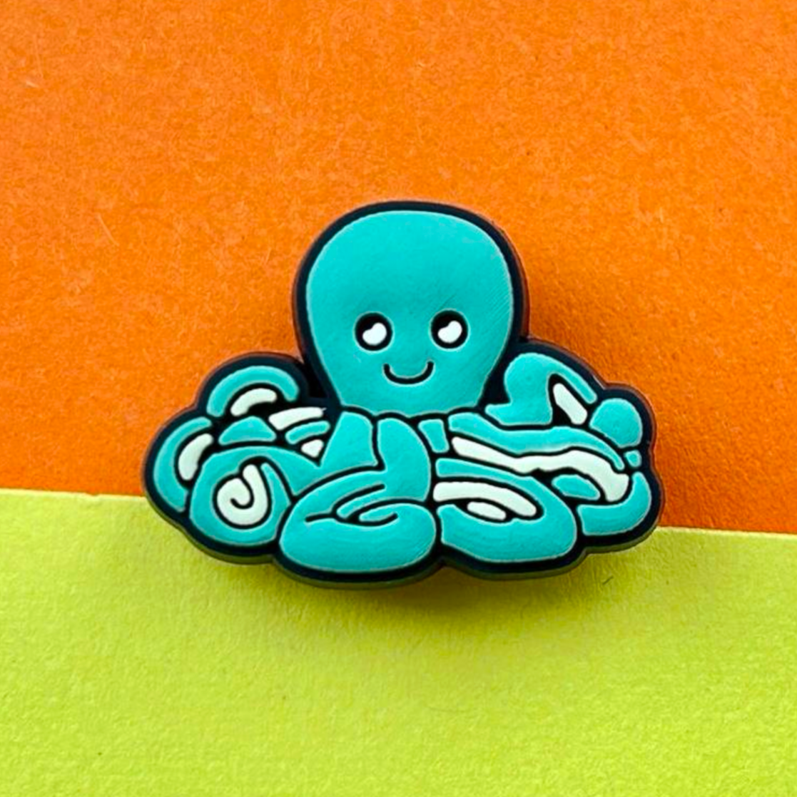 Octopus croc like shoe charm.