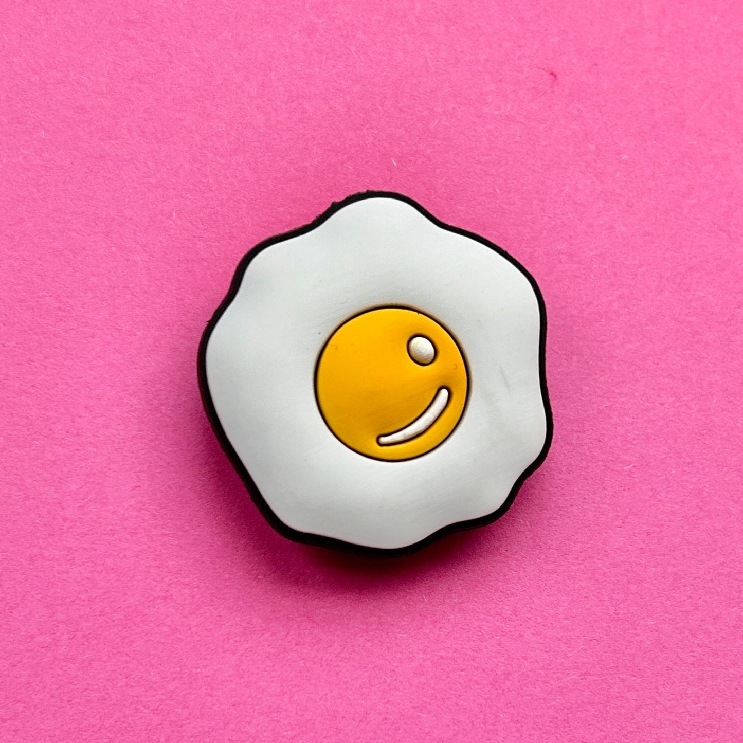 Fried egg croc like shoe charm. Yellow and white.
