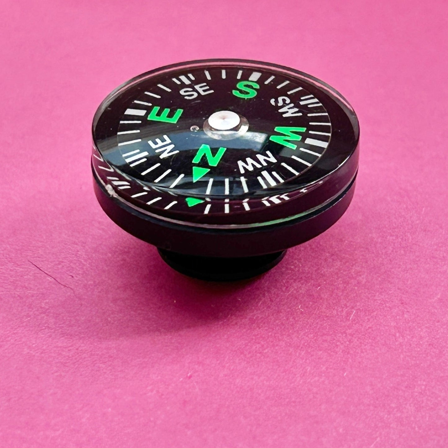 3D working compass croc shoe charm. Side view.