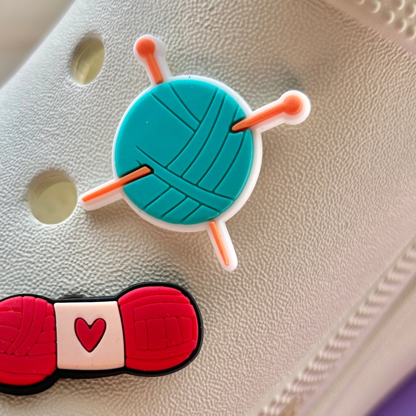 Ball of wool Croc shoe charm. Turquoise colour shown on a cream croc shoe.