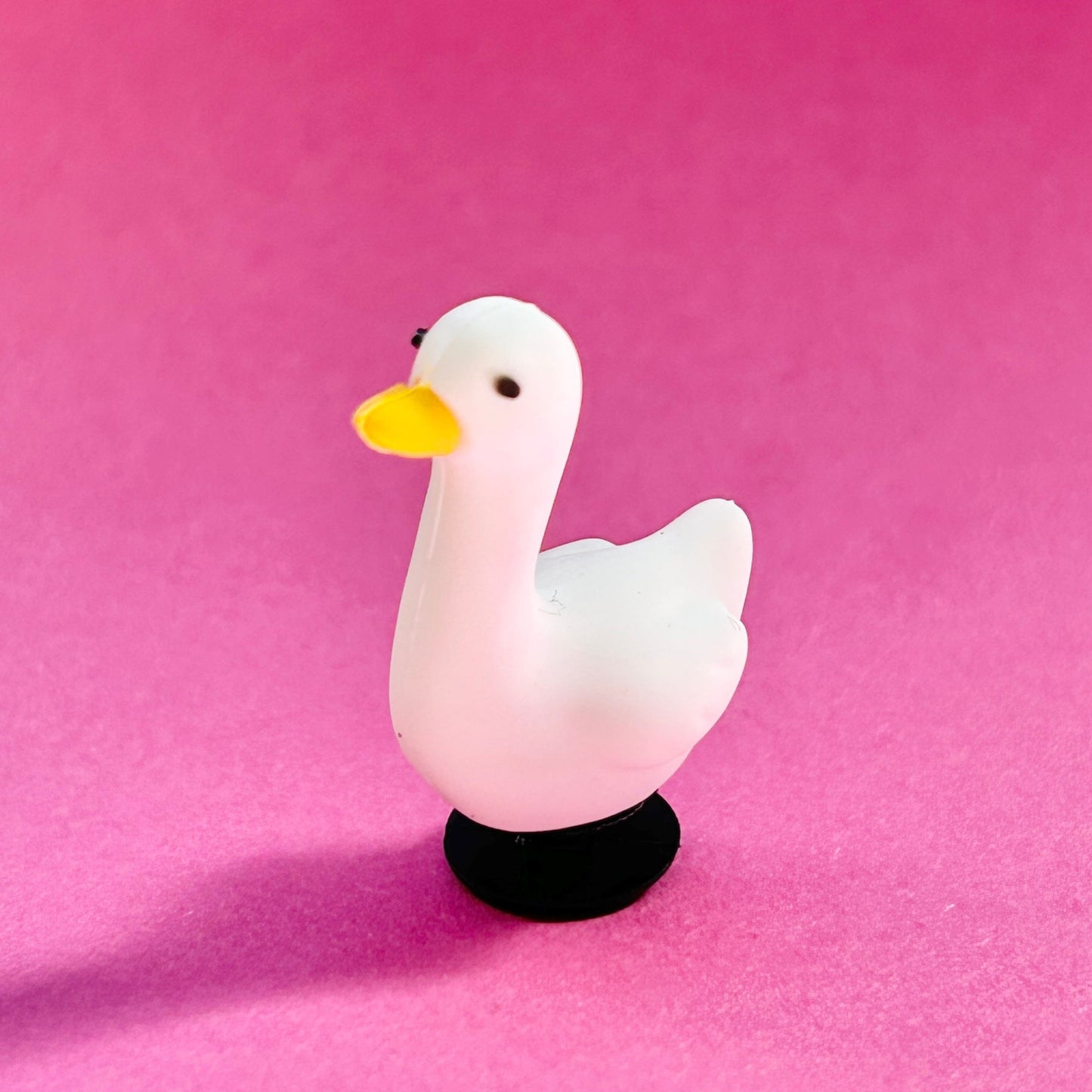 3D white goose bird croc shoe charm.