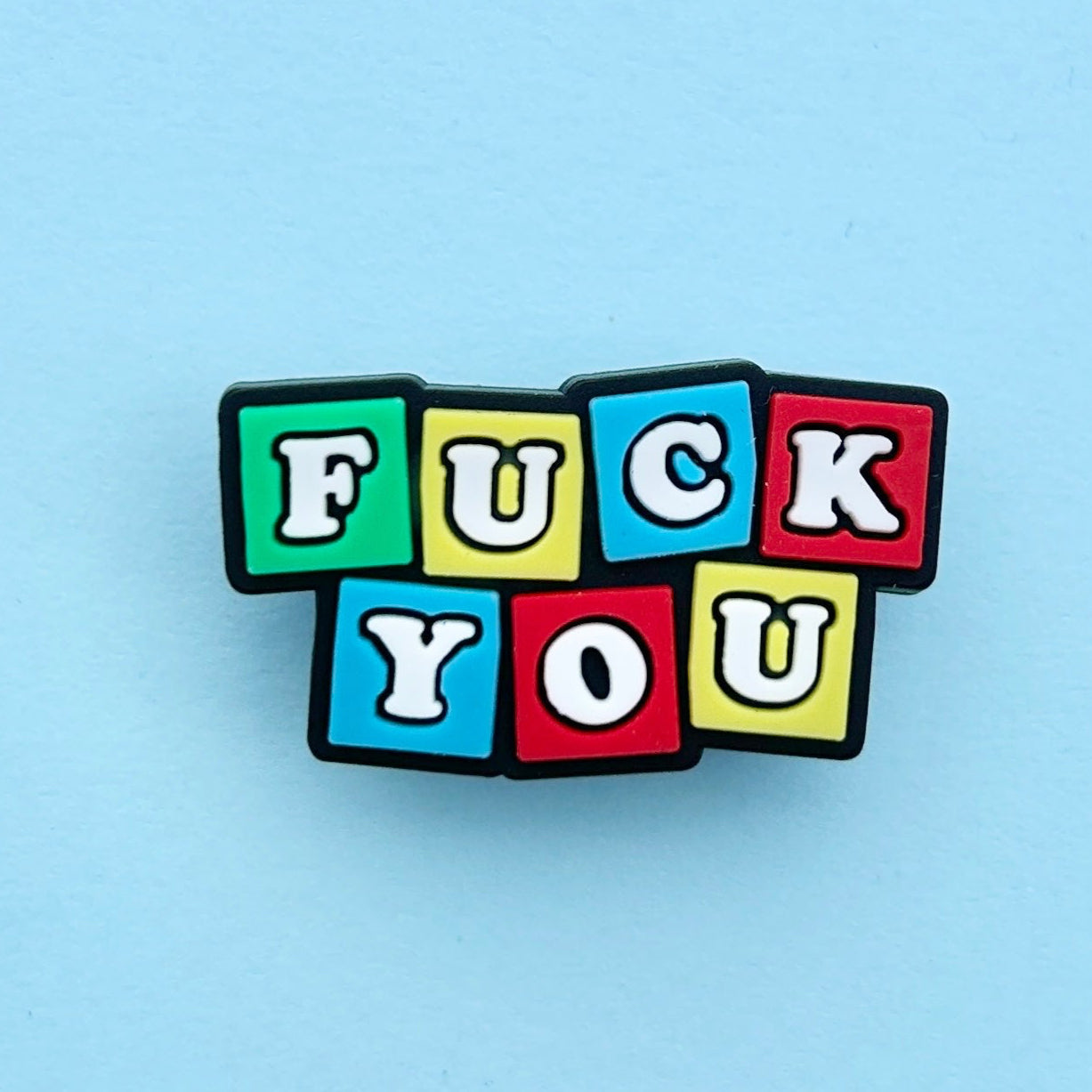 Multicoloured Fuck You Toy bricks croc like shoe charm.
