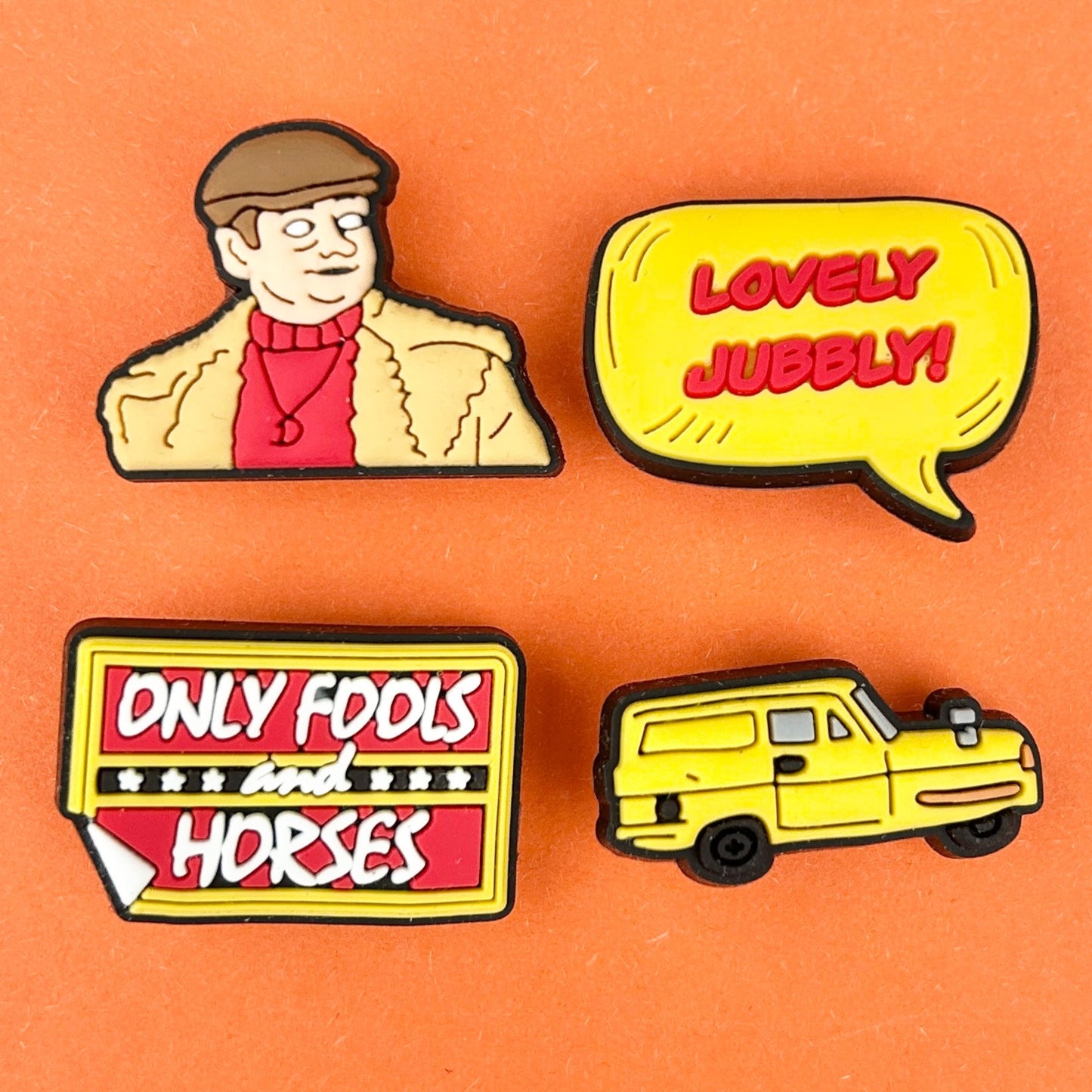 80s Sitcom charms. Lovely jubbly. Robin reliant. Only Fools. Del. Yellow colour croc charms.