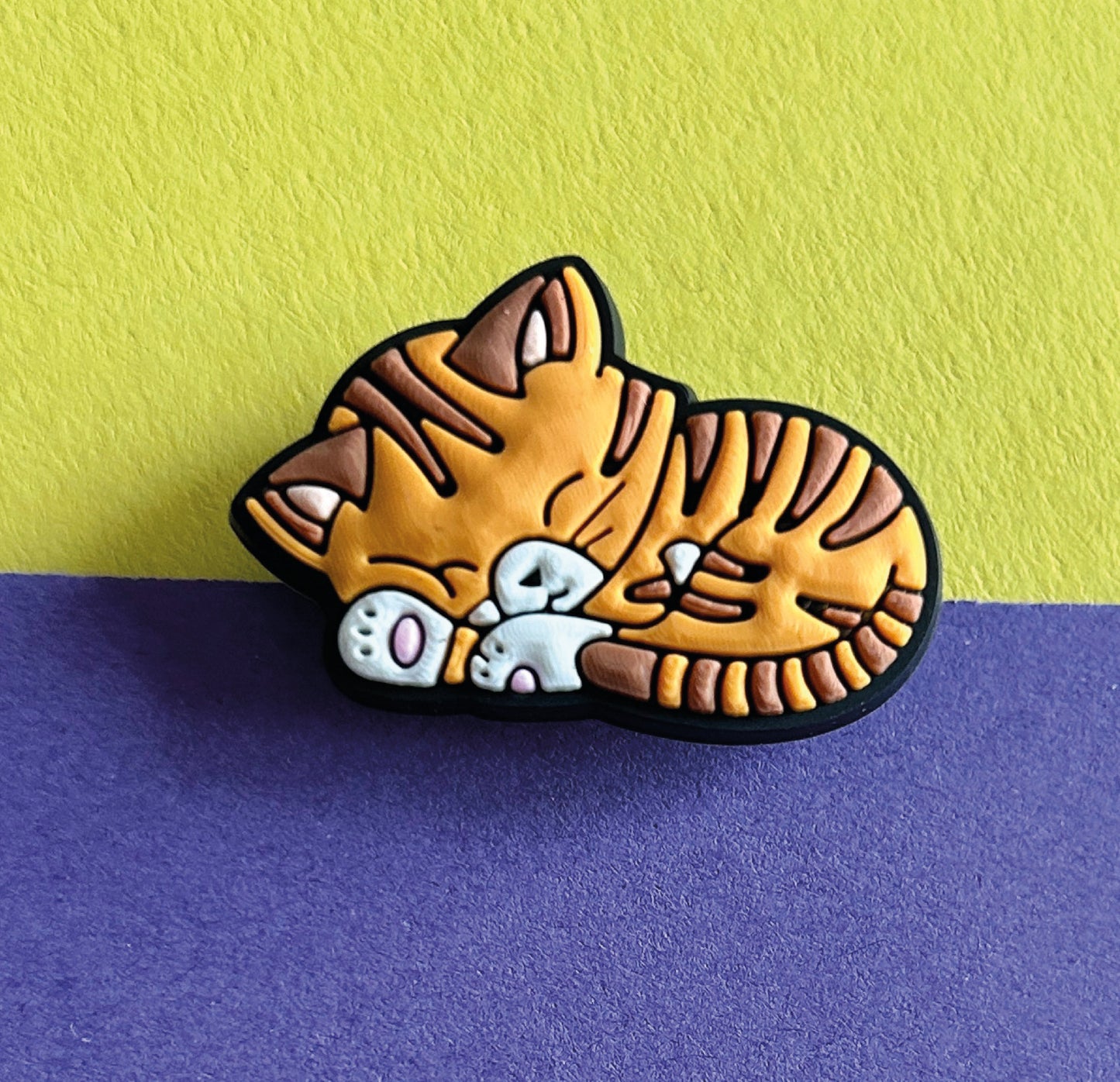 Super cute sleeping ginger cat croc like shoe charm.
