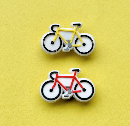 Yellow and Red Bicycle shoe charms.