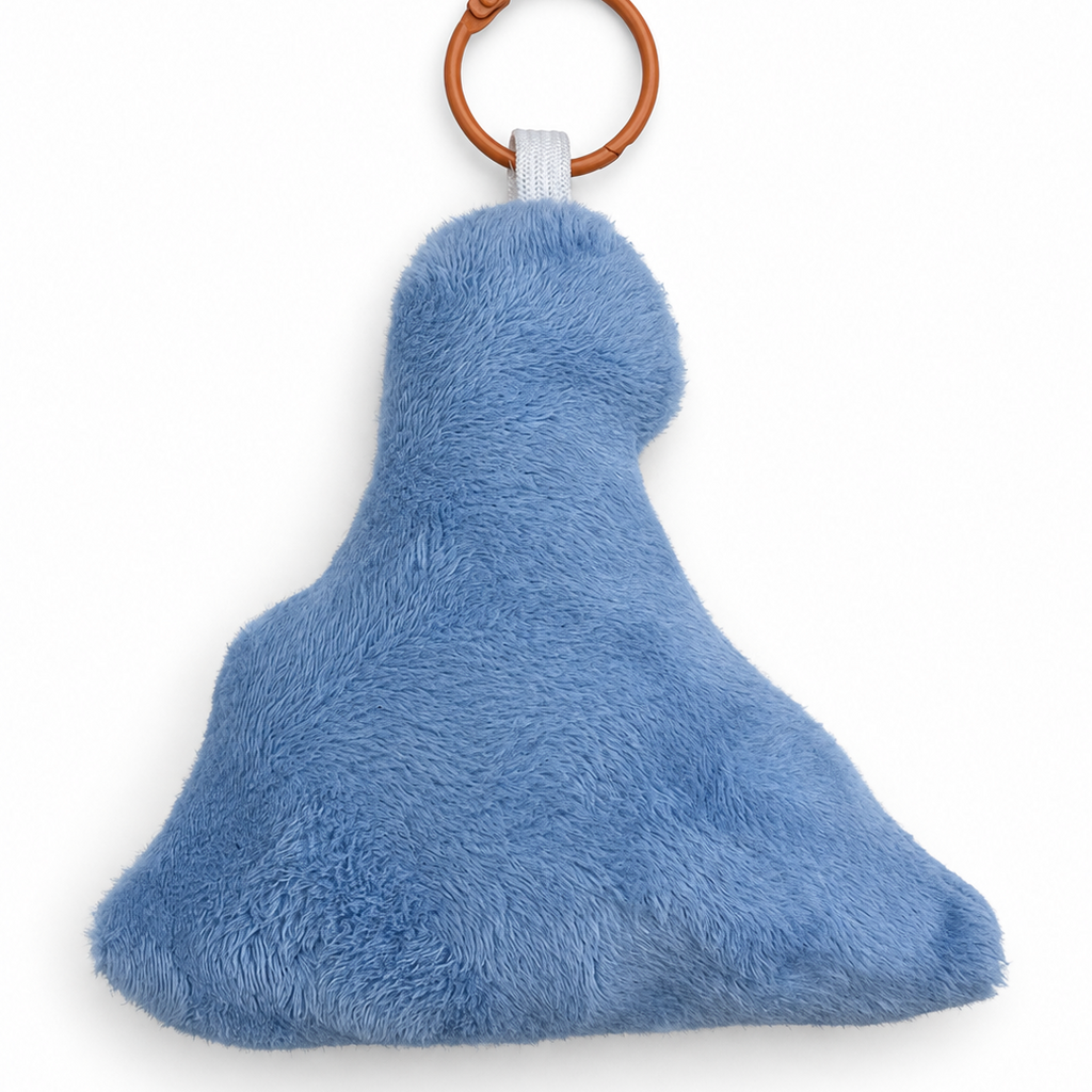A light blue plush keyring with a brown leather key ring and white plastic connector, shown on a solid white background.