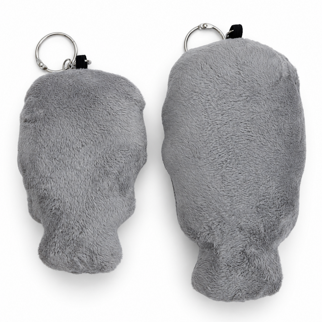back view of two t800 robot keyrings that are handmade from plush fabric. 