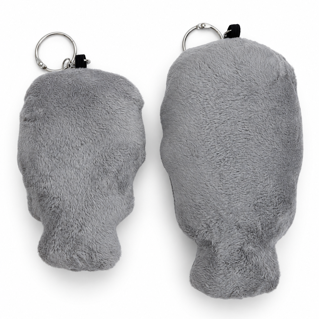 back view of two t800 robot keyrings that are handmade from plush fabric. 