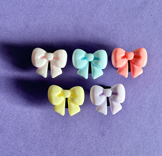 Selection of resin 3D bow shoe charms. 