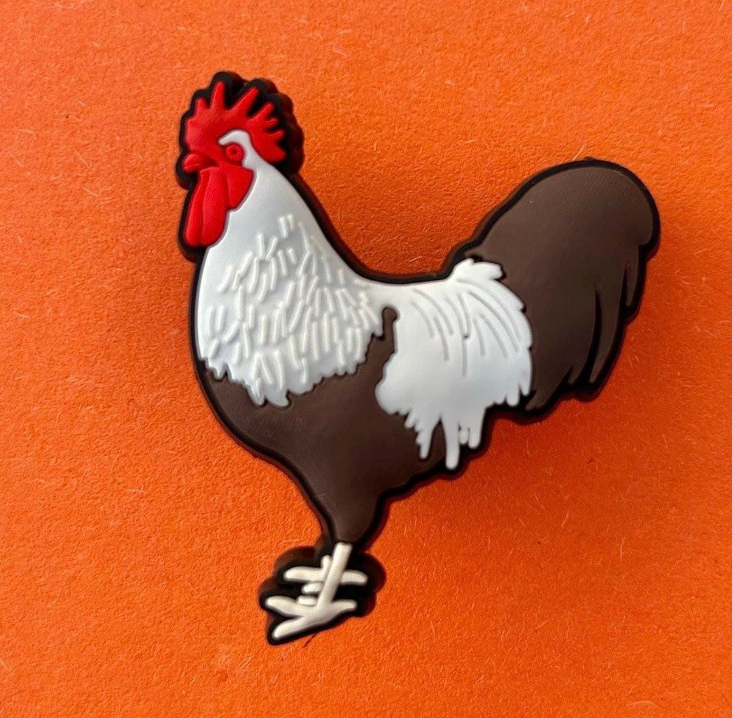 Novelty chicken shoe charm for Croc style shoes.