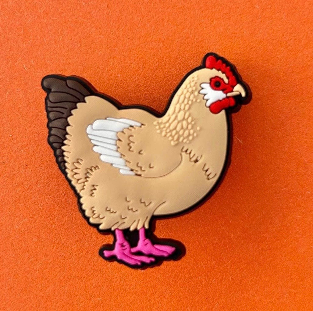 Novelty chicken shoe charm for Croc style shoes.
