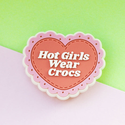 Hot girls wear crocs pink shoe charm. Scalloped around the edge. Rubber material. 