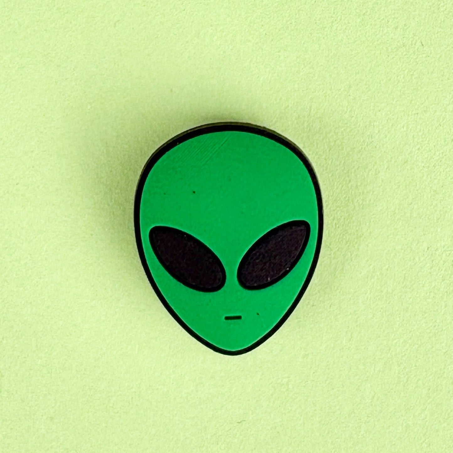 Green Alien head shoe charm. 